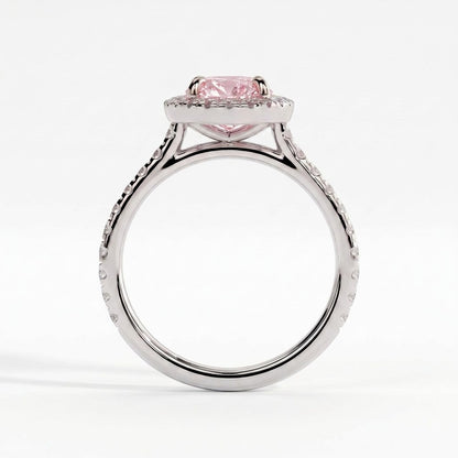 Fancy Vivid Pink oval lab-grown diamond halo engagement ring with cathedral pavé band in 18K (750) white gold, side profile showing the cathedral setting 