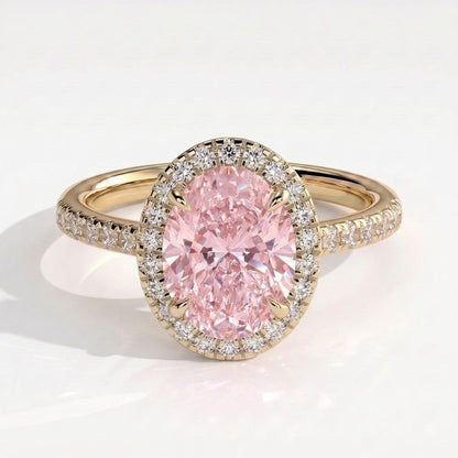 Fancy Vivid Pink oval lab-grown diamond halo engagement ring with cathedral pavé band in 18K (750) yellow gold, front view 