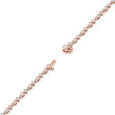 Delia pear and round lab-grown diamond tennis bracelet in 14K (585) rose gold, full length, diagonal view 