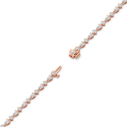 Delia pear and round lab-grown diamond tennis bracelet in 14K (585) rose gold, full length, diagonal view 