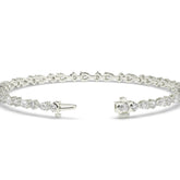 Delia pear and round lab-grown diamond tennis bracelet in 14K (585) white gold, clasp open, detail view 