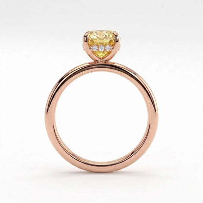 Fancy Vivid Yellow elongated cushion lab-grown diamond engagement ring with flat cigar band and hidden halo in 14K (585) rose gold, side profile showing the hidden halo 