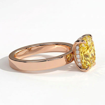 Fancy Vivid Yellow elongated cushion lab-grown diamond engagement ring with flat cigar band and hidden halo in 18K (750) rose gold, detail view of the flat cigar band 