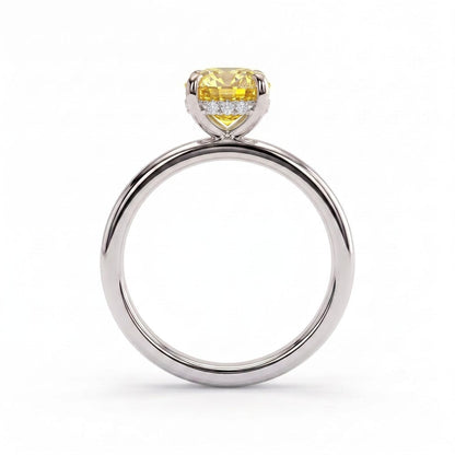 Fancy Vivid Yellow elongated cushion lab-grown diamond engagement ring with flat cigar band and hidden halo in 18K (750) white gold, side profile showing the hidden halo 