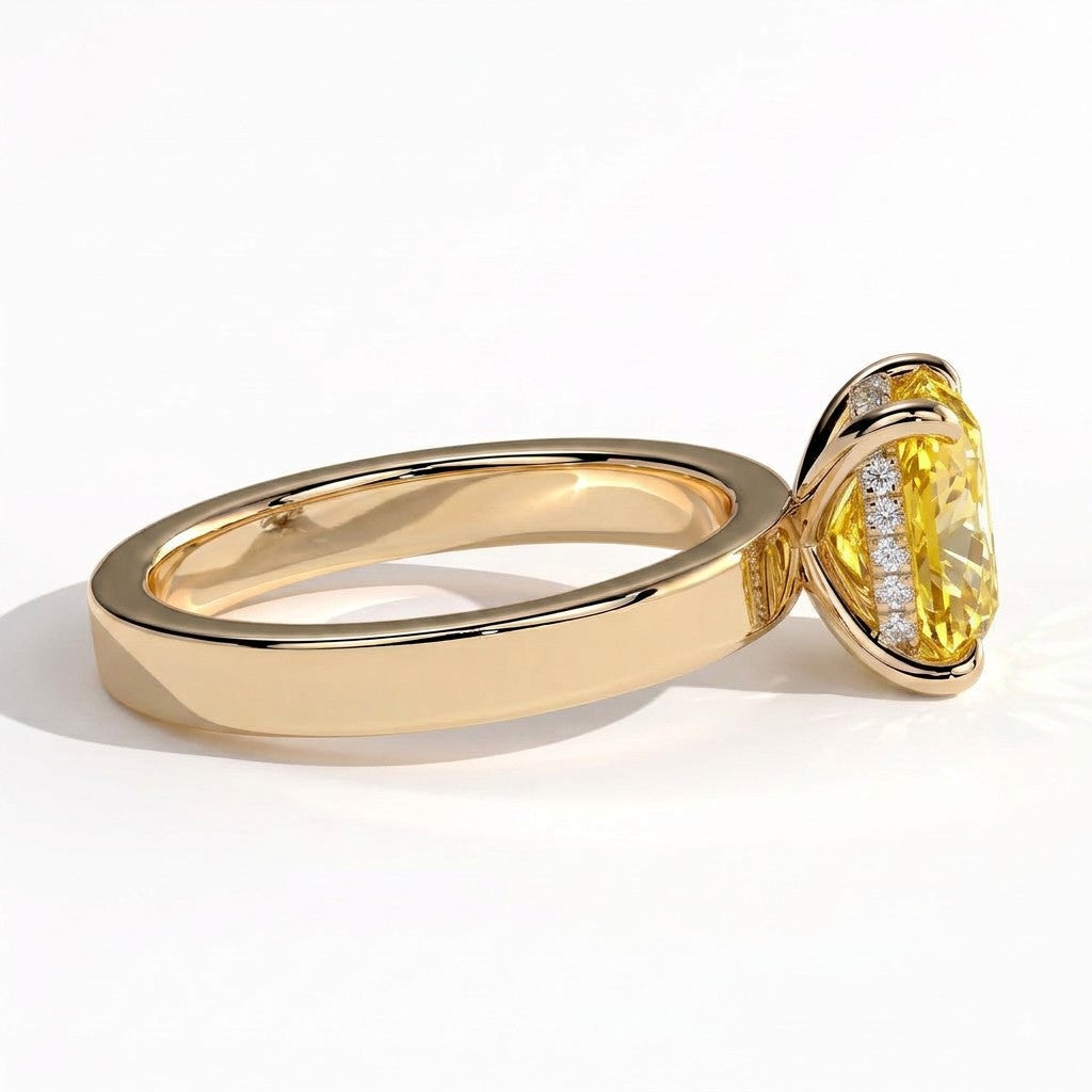 Fancy Vivid Yellow elongated cushion lab-grown diamond engagement ring with flat cigar band and hidden halo in 18K (750) yellow gold, detail view of the flat cigar band 