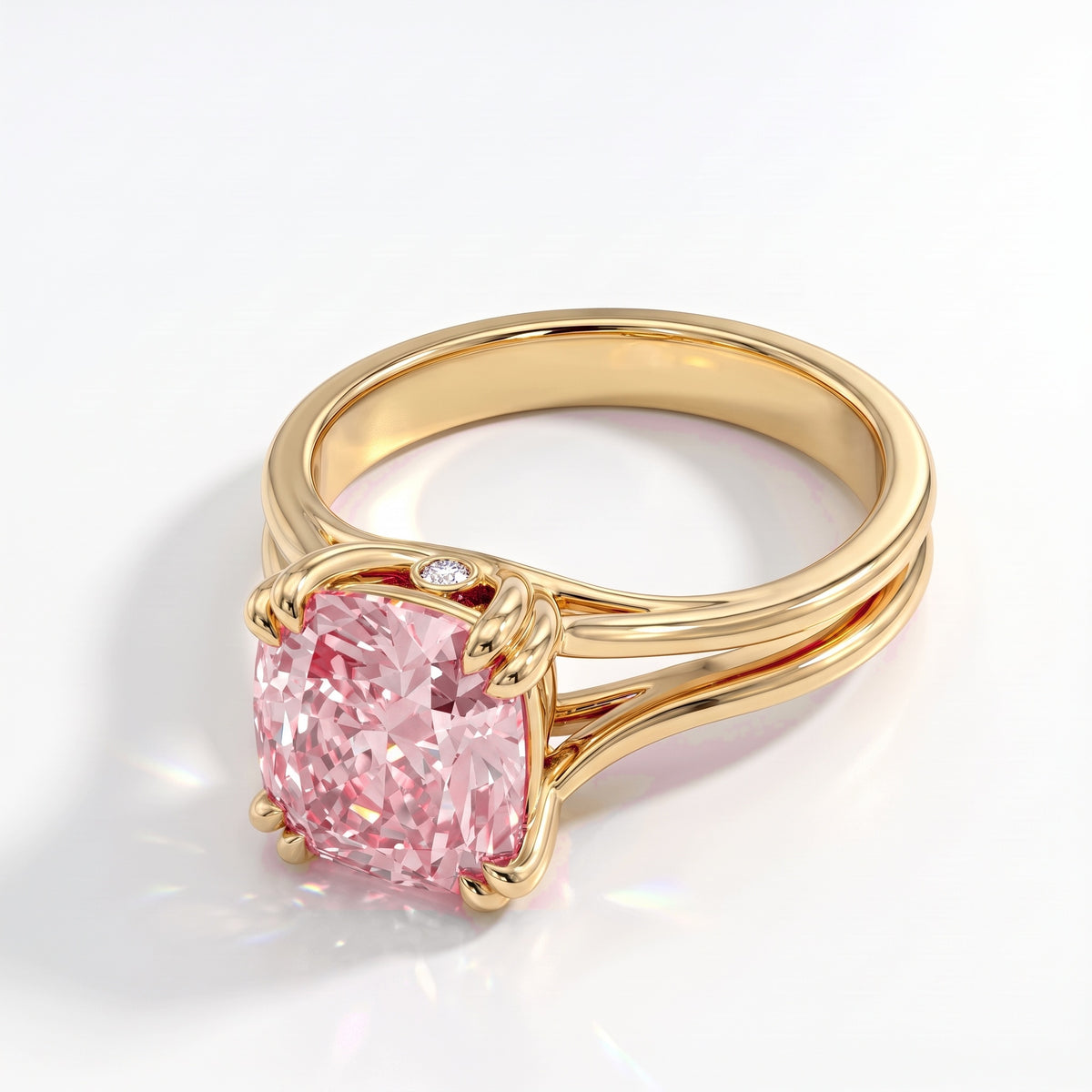 Fancy Vivid Pink cushion lab-grown diamond split shank ring in 18K (750) yellow gold, angled view 