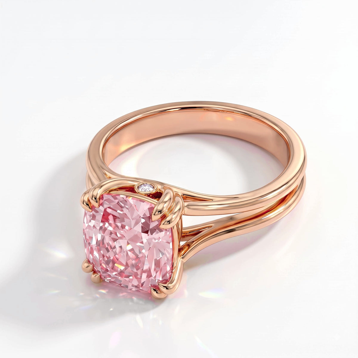 Fancy Vivid Pink cushion lab-grown diamond split shank ring in 18K (750) rose gold, angled view 