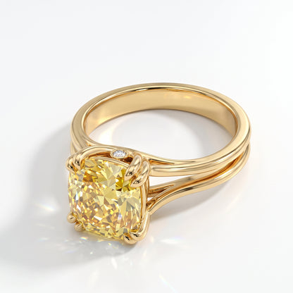 Fancy Vivid Yellow cushion lab-grown diamond split shank ring in 14K (585) yellow gold, angled view 