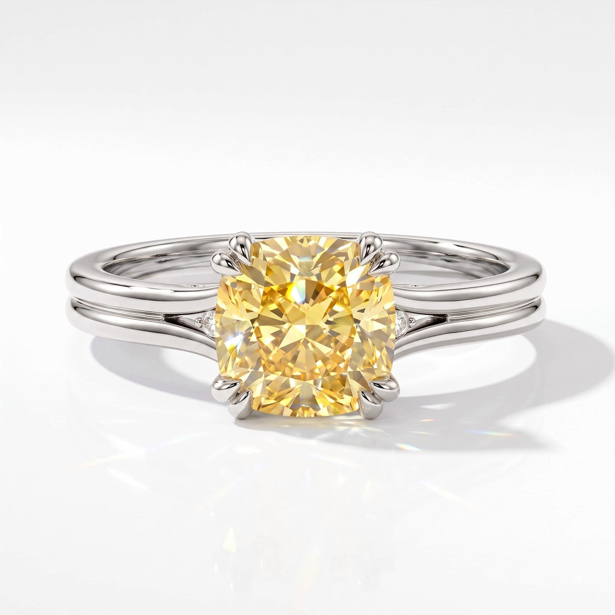 Fancy Vivid Yellow cushion lab-grown diamond split shank ring in 14K (585) white gold, top view 