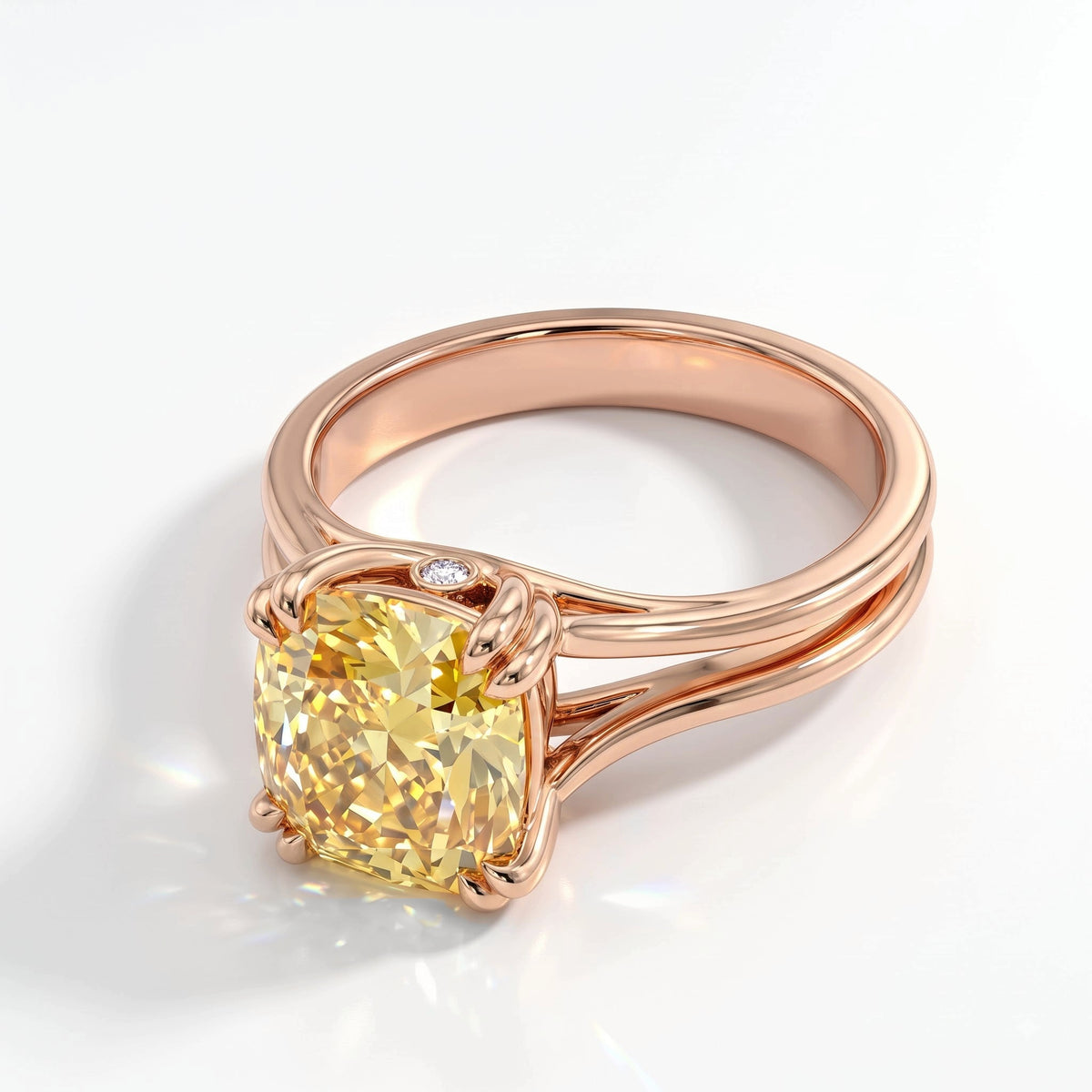 Fancy Vivid Yellow cushion lab-grown diamond split shank ring in 18K (750) rose gold, angled view 