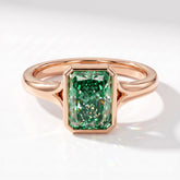 Fancy Vivid Green radiant lab-grown diamond bezel ring in 18K (750) rose gold, angled top view 