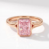 Fancy Vivid Pink radiant lab-grown diamond bezel ring in 14K (585) rose gold, angled top view 