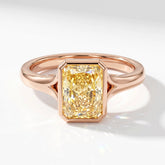 Fancy Vivid Yellow radiant lab-grown diamond bezel ring in 14K (585) rose gold, angled top view 