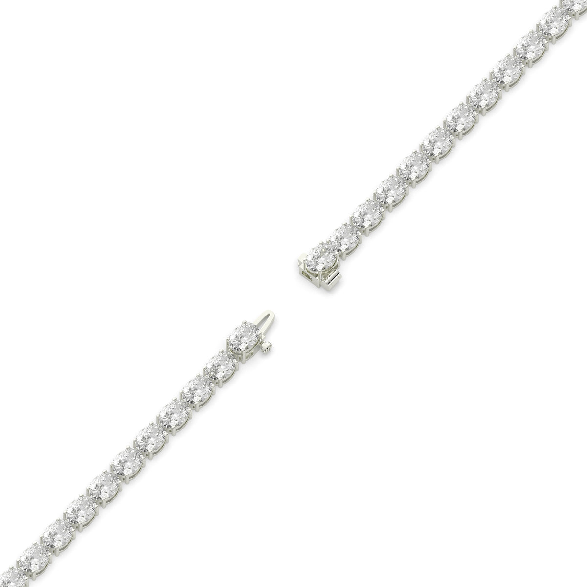 Elvira east-west oval lab-grown diamond tennis bracelet in 14K (585) white gold, full length, diagonal view 