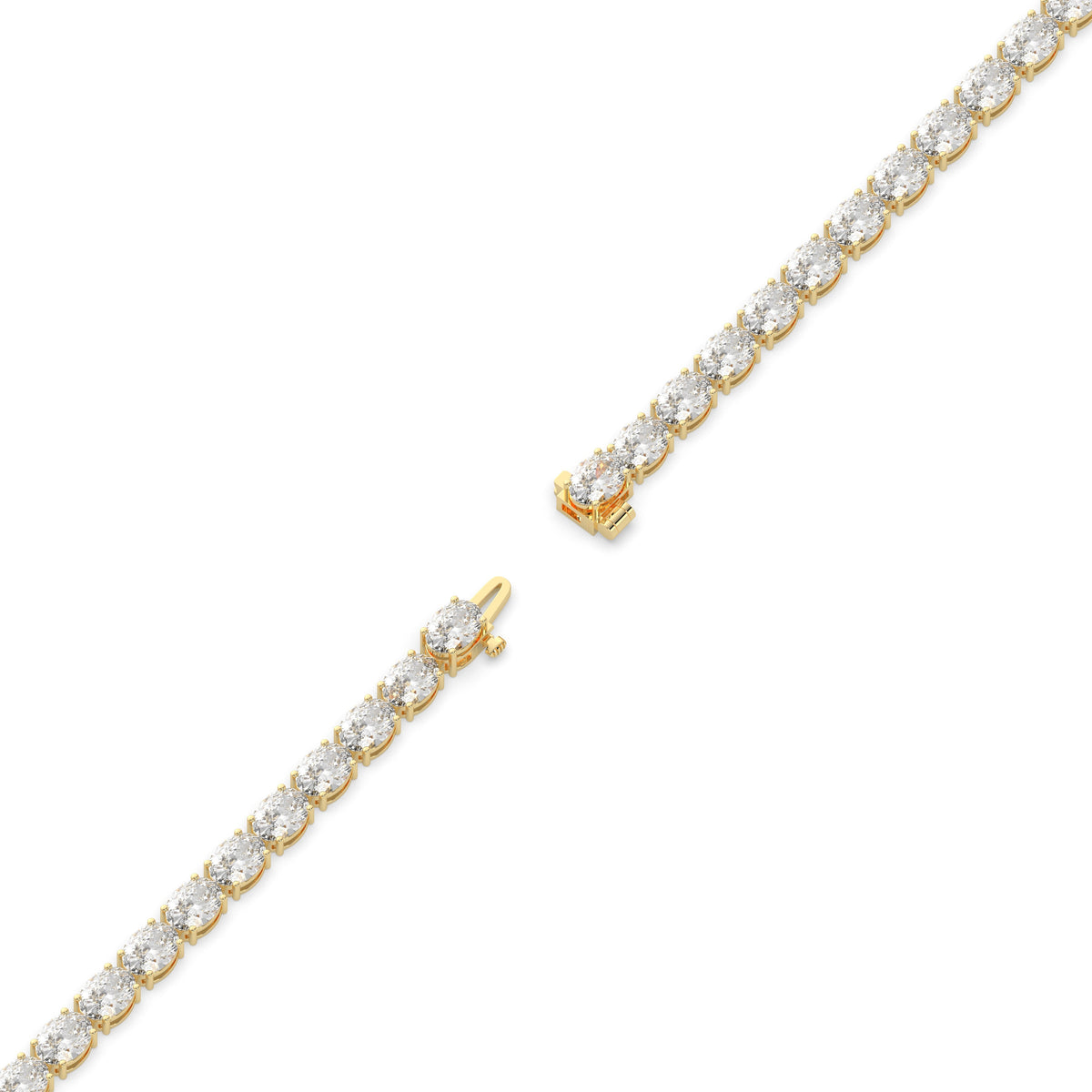 Elvira east-west oval lab-grown diamond tennis bracelet in 14K (585) yellow gold, full length, diagonal view 