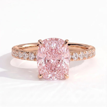 Fancy Vivid Pink elongated cushion lab-grown diamond engagement ring with hidden halo and pavé band in 14K (585) rose gold, front view 
