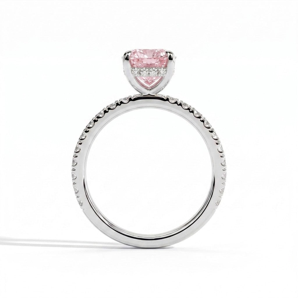 Fancy Vivid Pink elongated cushion lab-grown diamond engagement ring with hidden halo and pavé band in 14K (585) white gold, side profile showing the hidden halo 