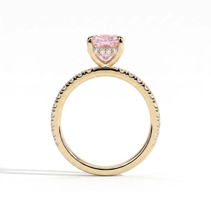 Fancy Vivid Pink elongated cushion lab-grown diamond engagement ring with hidden halo and pavé band in 14K (585) yellow gold, side profile showing the hidden halo 