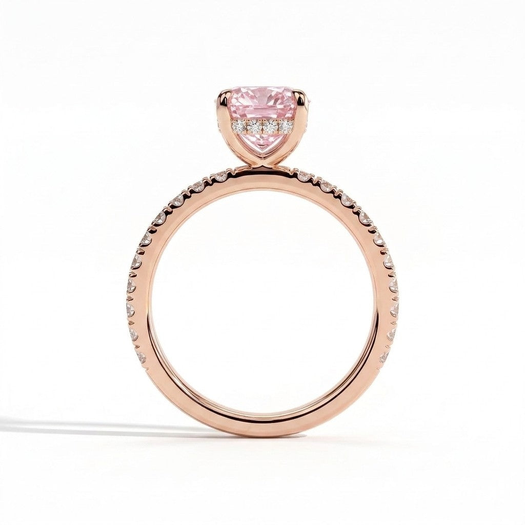 Fancy Vivid Pink elongated cushion lab-grown diamond engagement ring with hidden halo and pavé band in 18K (750) rose gold, side profile showing the hidden halo 