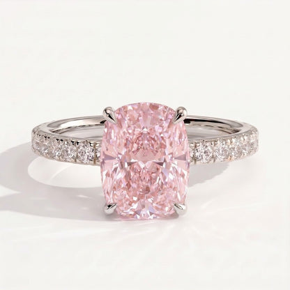 Fancy Vivid Pink elongated cushion lab-grown diamond engagement ring with hidden halo and pavé band in 18K (750) white gold, front view 