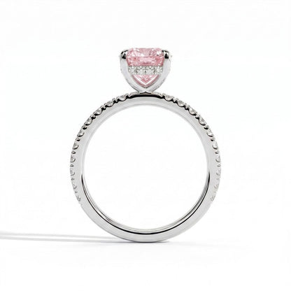 Fancy Vivid Pink elongated cushion lab-grown diamond engagement ring with hidden halo and pavé band in 18K (750) white gold, side profile showing the hidden halo 