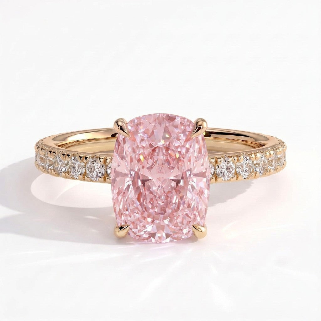 Fancy Vivid Pink elongated cushion lab-grown diamond engagement ring with hidden halo and pavé band in 18K (750) yellow gold, front view 