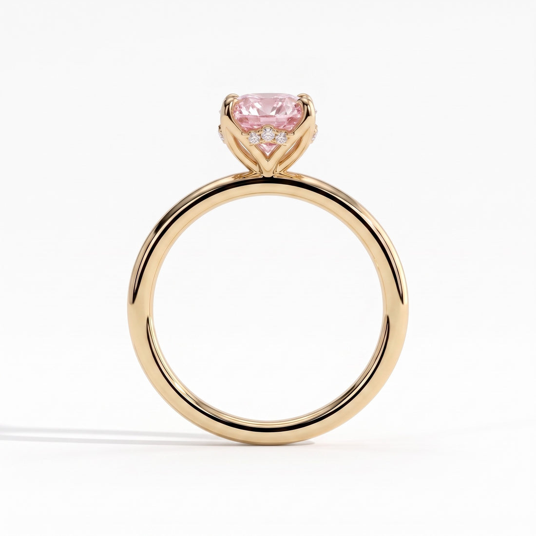 Fancy Vivid Pink oval lab-grown diamond solitaire engagement ring with petal gallery and hidden tiara in 14K (585) yellow gold, side profile showing the petal gallery 