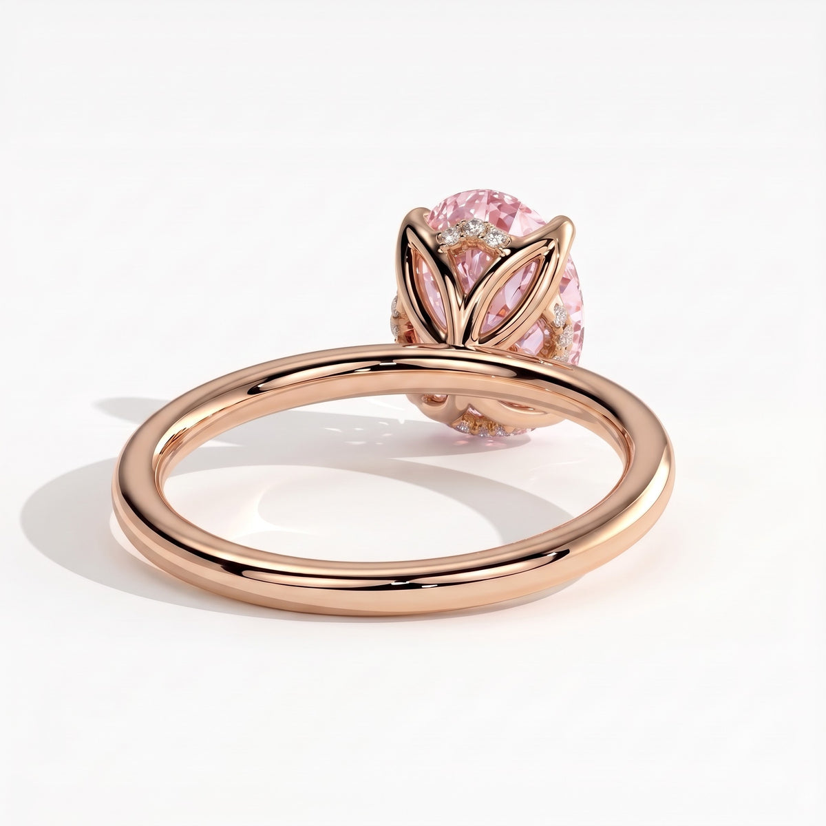 Fancy Vivid Pink oval lab-grown diamond solitaire engagement ring with petal gallery and hidden tiara in 18K (750) rose gold, back view 