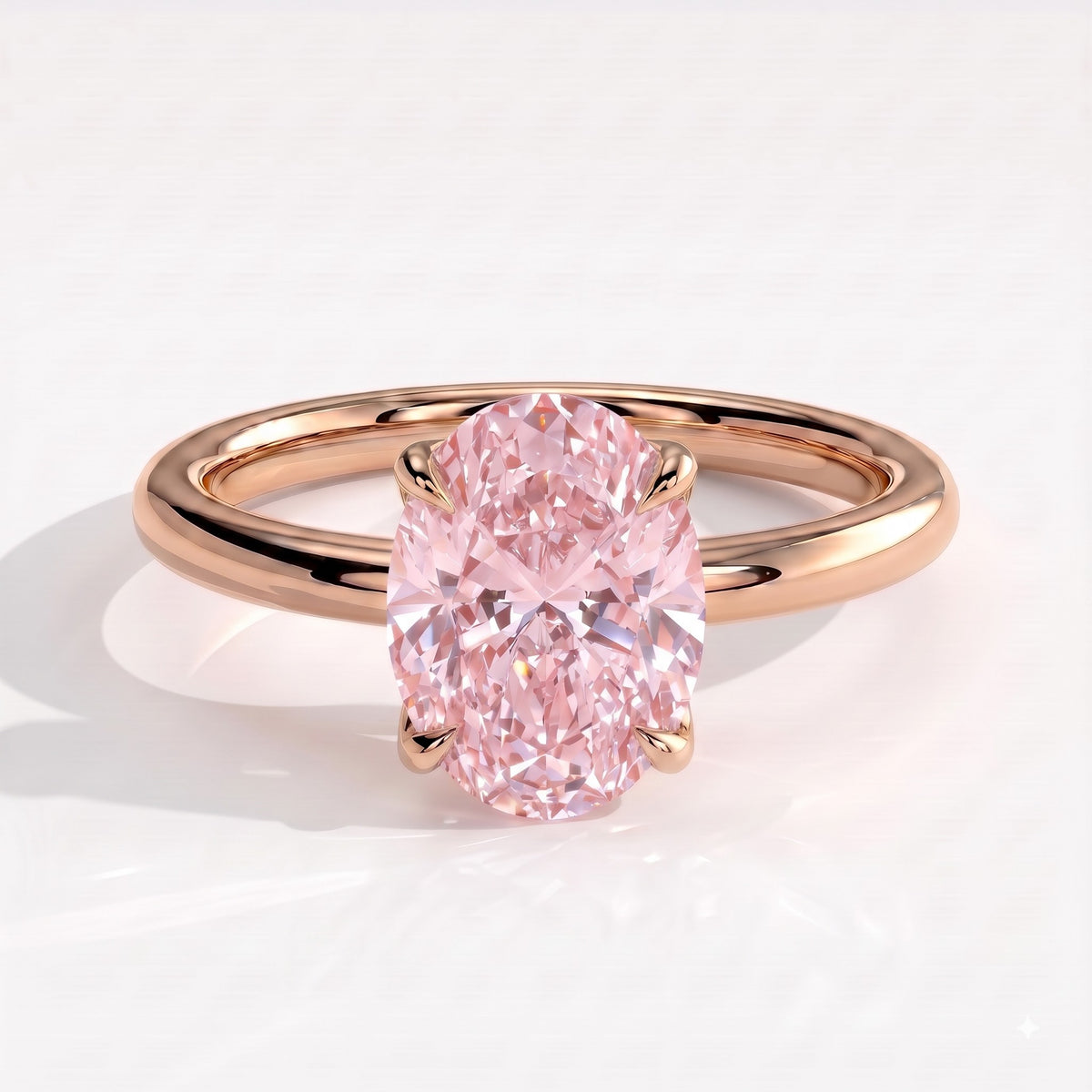Fancy Vivid Pink oval lab-grown diamond solitaire engagement ring with petal gallery and hidden tiara in 18K (750) rose gold, front view 
