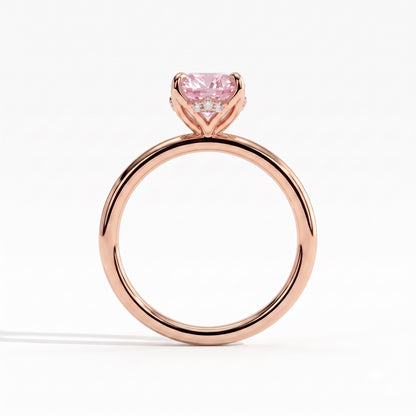Fancy Vivid Pink oval lab-grown diamond solitaire engagement ring with petal gallery and hidden tiara in 18K (750) rose gold, side profile showing the petal gallery 