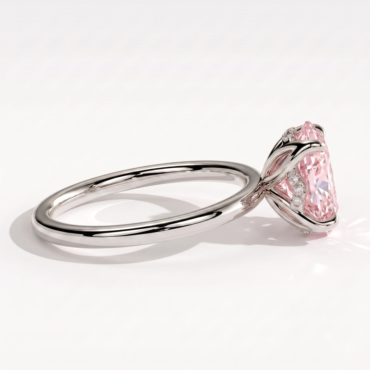 Fancy Vivid Pink oval lab-grown diamond solitaire engagement ring with petal gallery and hidden tiara in 18K (750) white gold, detail view of the hidden tiara 