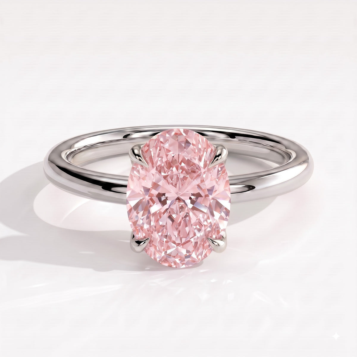 Fancy Vivid Pink oval lab-grown diamond solitaire engagement ring with petal gallery and hidden tiara in 950 platinum, front view 