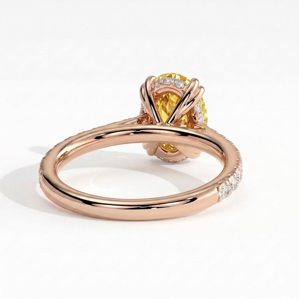 Fancy Vivid Yellow oval lab-grown diamond double claw engagement ring with pavé band and hidden halo in 14K (585) rose gold, back view showing the hidden halo 