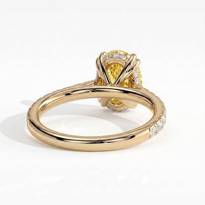 Fancy Vivid Yellow oval lab-grown diamond double claw engagement ring with pavé band and hidden halo in 14K (585) yellow gold, back view showing the hidden halo 