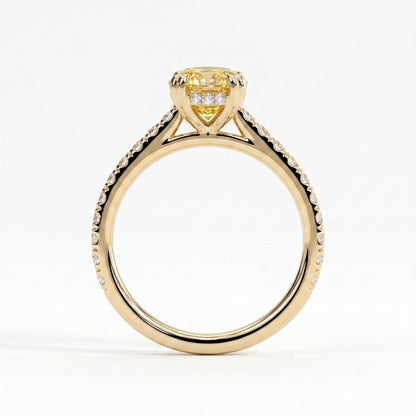 Fancy Vivid Yellow oval lab-grown diamond double claw engagement ring with pavé band and hidden halo in 14K (585) yellow gold, side profile showing the cathedral setting 