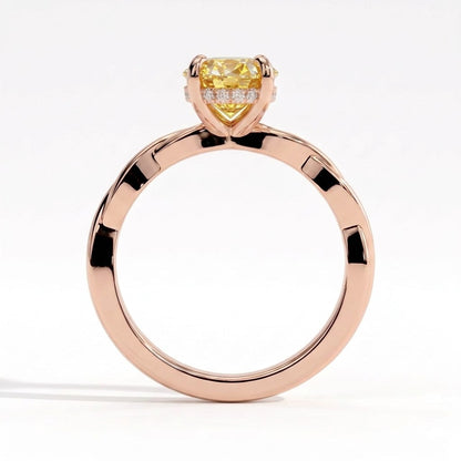 Fancy Vivid Yellow oval lab-grown diamond solitaire engagement ring with twisted band in 14K (585) rose gold, side profile 
