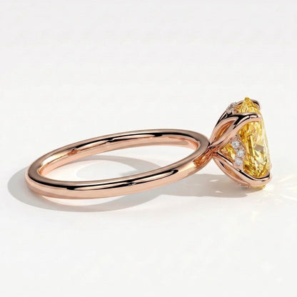 Fancy Vivid Yellow oval lab-grown diamond solitaire engagement ring with petal gallery and hidden tiara in 14K (585) rose gold, detail view of the hidden tiara 