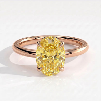 Fancy Vivid Yellow oval lab-grown diamond solitaire engagement ring with petal gallery and hidden tiara in 18K (750) rose gold, front view 