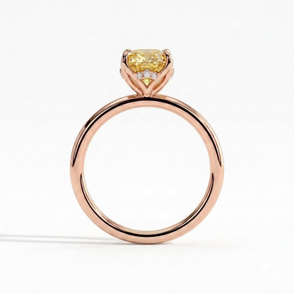 Fancy Vivid Yellow oval lab-grown diamond solitaire engagement ring with petal gallery and hidden tiara in 18K (750) rose gold, side profile showing the petal gallery 