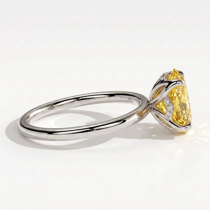 Fancy Vivid Yellow oval lab-grown diamond solitaire engagement ring with petal gallery and hidden tiara in 18K (750) white gold, detail view of the hidden tiara 