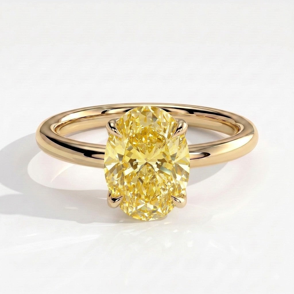 Fancy Vivid Yellow oval lab-grown diamond solitaire engagement ring with petal gallery and hidden tiara in 18K (750) yellow gold, front view 