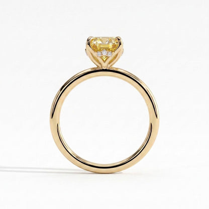 Fancy Vivid Yellow oval lab-grown diamond solitaire engagement ring with petal gallery and hidden tiara in 18K (750) yellow gold, side profile showing the petal gallery 