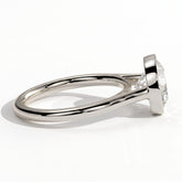 Round lab-grown diamond bezel-set solitaire engagement ring in 950 platinum, detail view 