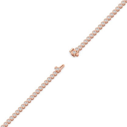 Lea round bezel lab-grown diamond tennis bracelet in 14K (585) rose gold, full length, diagonal view 