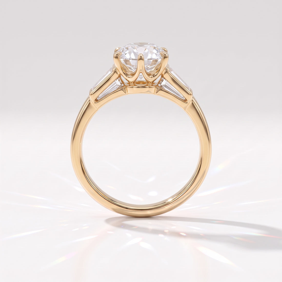 Old mine round lab-grown diamond vintage three-stone engagement ring with tapered baguettes in 14K (585) yellow gold, profile view showing the six-claw crown basket 