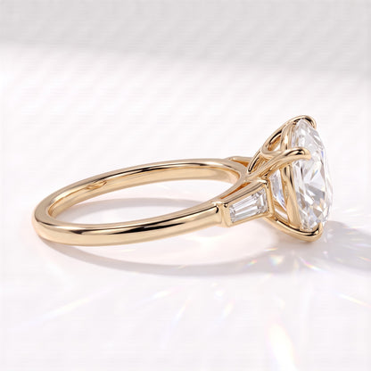 Old mine round lab-grown diamond vintage three-stone engagement ring with tapered baguettes in 14K (585) yellow gold, side view showing the tapered baguette 