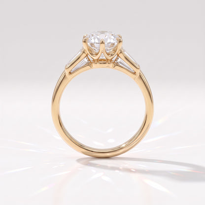 Old mine round lab-grown diamond vintage three-stone engagement ring with tapered baguettes in 18K (750) yellow gold, profile view showing the six-claw crown basket 