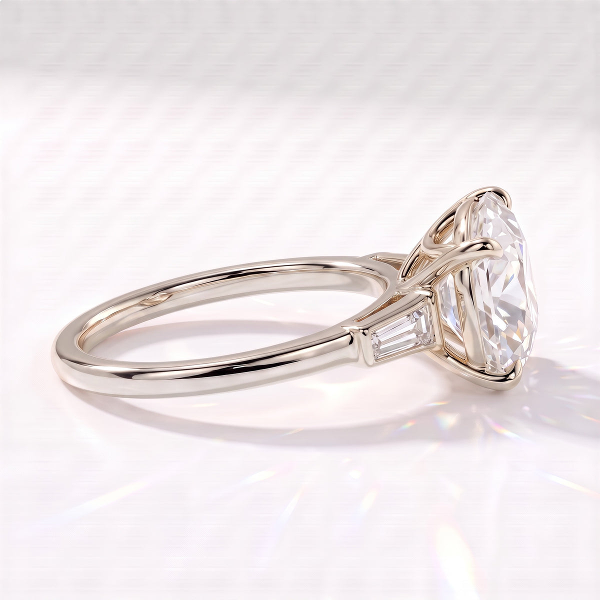 Old mine round lab-grown diamond vintage three-stone engagement ring with tapered baguettes in 950 platinum, side view showing the tapered baguette 