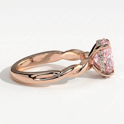 Fancy Vivid Pink oval lab-grown diamond solitaire engagement ring with twisted band in 14K (585) rose gold, detail view of the twisted band 