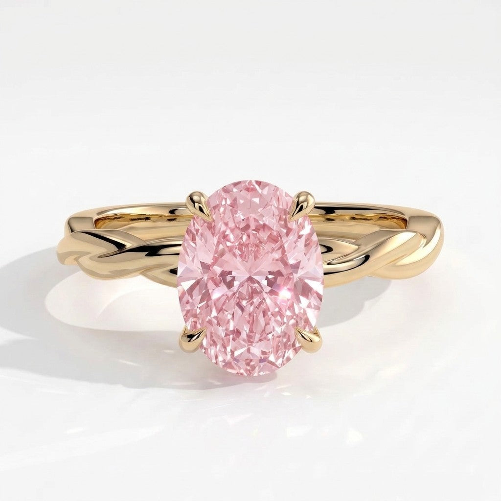 Fancy Vivid Pink oval lab-grown diamond solitaire engagement ring with twisted band in 18K (750) yellow gold, front view 